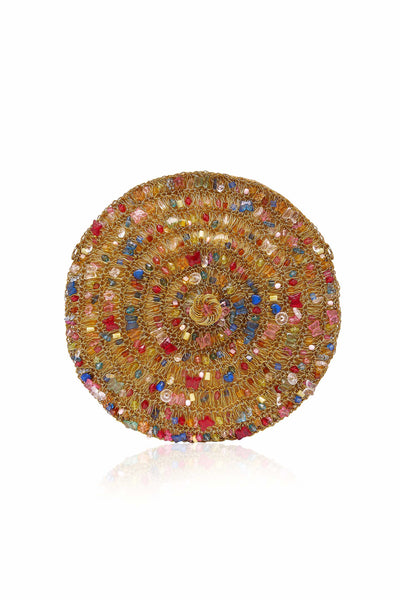 SHOP The Meena Carousel Clutch bag, from Mae Cassidy SS21 Poolside Glamour Collection https://maecassidy.com/ Each piece is handmade by skilled artisans and reminisces a nostalgia for 1950’s picnic baskets. Hand-crocheted from pieces of gold-tone metal work and embellished rainbow coloured bead detailing, to form a soft structured, circular carousel shape. Photography: Annie Lai, Set: Laura Little, MUA: Jinny Kim, Styling: Rubina Marchiori, Direction: Georgina Mae Lindsay