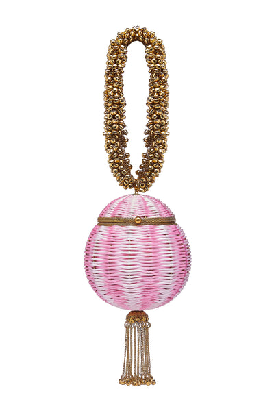 SHOP The Babi Beach Bracelet Clutch Bag from Mae Cassidy's SS21 'Poolside Glamour Collection'; https://maecassidy.com/ It’s playful hand woven powder pink detailing, reminisce a nostalgia for the 1950’s picnic style. Each piece is handmade by a skilled artisan from recyclable gold tone metalwork in a structured circular shape with bell detailing and a swishy chain tassel. Photography: Annie Lai, Set: Laura Little, MUA: Jinny Kim, Styling: Rubina Marchiori, Direction: Georgina Mae Lindsay