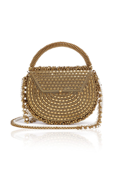 Mae Cassidy Gold Malini Pearl Handbag Bracelet Clutch Bag. Modelled by Emma Laird. Photography by Annie Lai. 