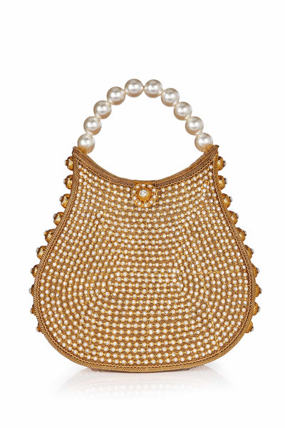 The Mae Cassidy Gold Nimmi Crystal Pearl Purse Handbag, from our New In "All That Glitters" collection. It's the only accessory you'll need to dazzle after dark.   Embellished with over 2000 hand-placed, light catching sparkling crystals and oh-so-pretty pearl detailing. Slide your arm through it's elegant pearl top handle, to keep you hands free to step into cocktail hour. 