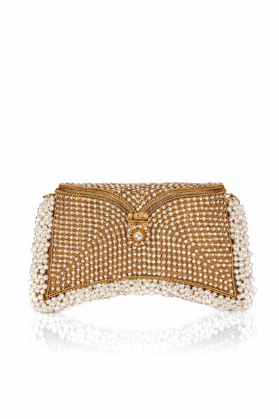 Introducing the ultimate Mae Cassidy glittering party piece; The Zeenat Pearl Crystal Gold Clutch Bag, from our New In "All That Glitters" collection. It's the only accessory you'll need to dazzle after dark.   Embellished with over 2000 hand-placed, light catching, sparkling crystals and oh-so-pretty pearl detailing. It's detachable handmade chain, makes it the perfect plus one to keep you hands free to hit the dance floor.