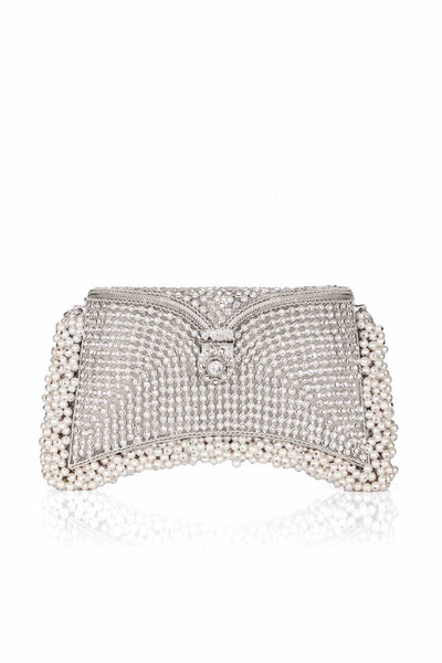 Introducing the ultimate Mae Cassidy glittering party piece; The Zeenat Pearl Crystal Silver Clutch Bag, from our New In "All That Glitters" collection. It's the only accessory you'll need to dazzle after dark.   Embellished with over 2000 hand-placed, light catching, sparkling crystals and oh-so-pretty pearl detailing. It's detachable handmade chain, makes it the perfect plus one to keep you hands free to hit the dance floor.